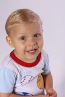 smiling child boy looring up