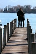 couple in love on a wooden pier