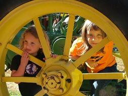 Happy girls playing on a farm