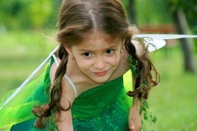 portrait of girl in the green princess dress