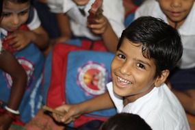 smiling young children in childhood