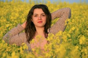 portrait of a woman in the flowering field