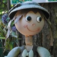 decorative doll in the garden