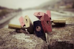 padlocks on the stone