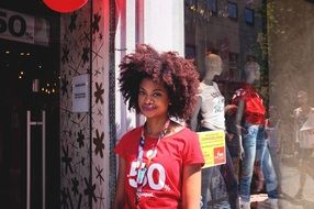 curly girl in red t-shirt