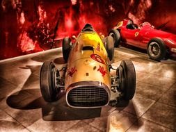 Ferrari racing in abstract background