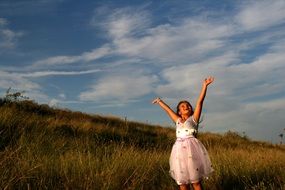 girl in princess dress in the meadow