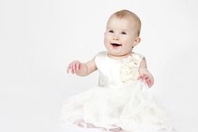 photo baby in a wedding dress