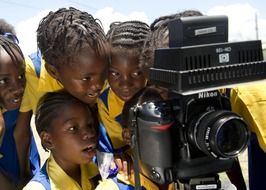 children look into the camera