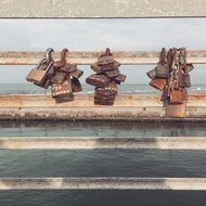 old rusty locks on the fence