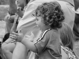 black and white photo of a happy child