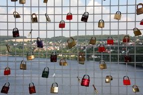 colorful locks on the lattice of the bridge