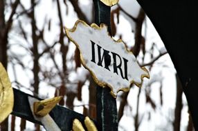 the cross in the cemetery inri