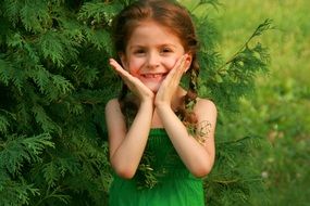 smiling girl in green dress
