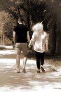 back view of a loving couple on a walk