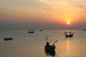 fishing boats at sunset in Thailand