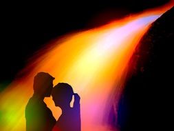 loving couple in the rays of light