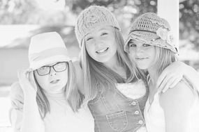 three girls friends in black and white background