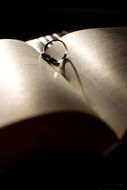 Wedding ring on a book