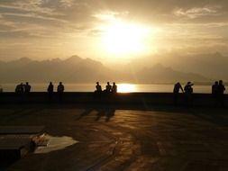 silhouettes of lovers at sunset