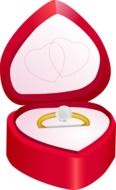 gold ring in a red heart-shaped box