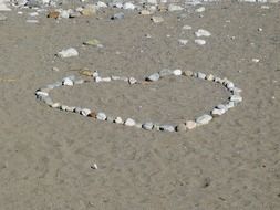 heart beach sand stones love