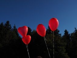 four red balloons