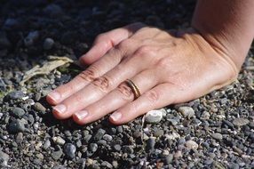 engagement ring on young girlâs hand