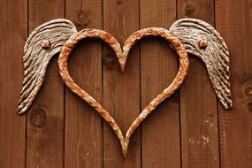 forged heart with wings on the door