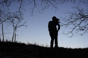 Landscape of lonely girl in a forest