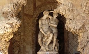 stone sculpture of lovers in a cave in Italy