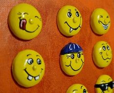 Smileys on a brown surface