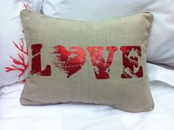 pillow with the inscription love