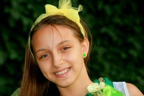 girl with yellow bandage on head