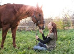 GIrl with horse on the farm