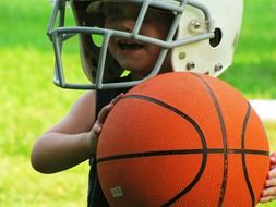 happy child with sports equipment