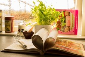 cookbook on a kitchen table