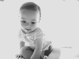 black and white image of a small child