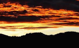 beautiful fiery sunset over the mountains
