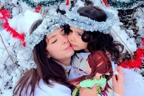 portrait of mother with daughter in Christmas time