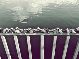 locks on the bridge over the river