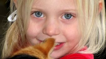 little girl with white hair close up