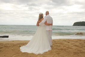 bride and groom on the beach