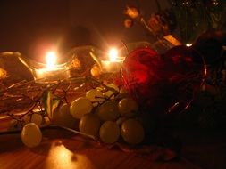 grapes and lightened candles