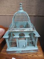 Old blue birdcage