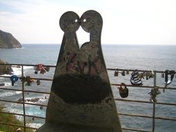 romantic couple figure on seaside, italy, Cinque Terre, Via dell' Amore