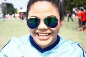 portrait of a brunette in sunglasses