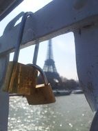 Two padlocks on the bridge