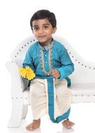 happy child in traditional indian costume