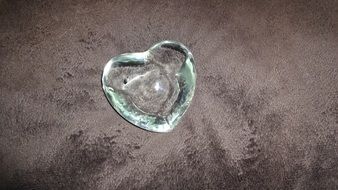 glass heart on the stone